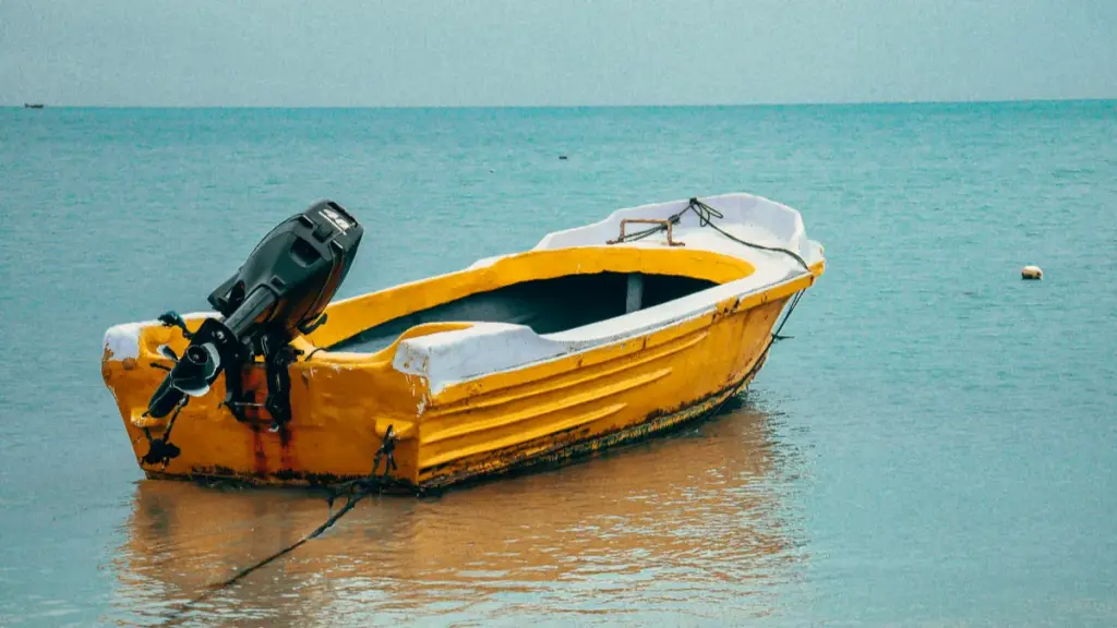 a yellow boat in the water
