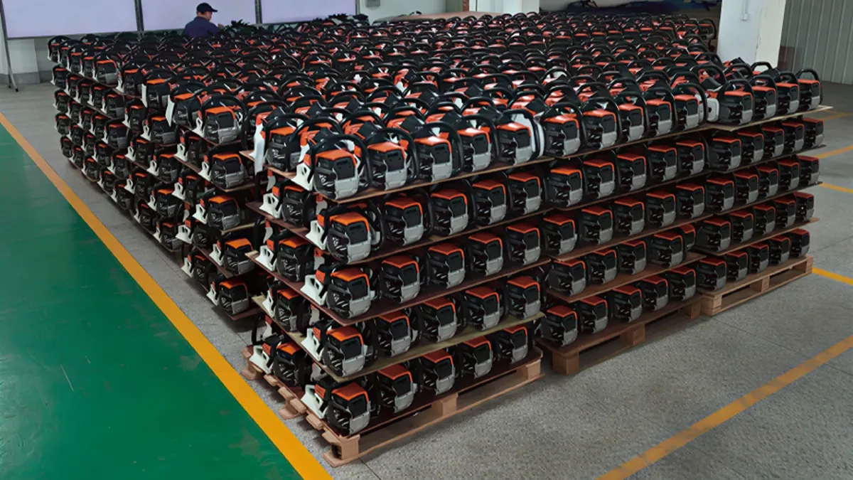 A warehouse floor packed with stacked red chainsaws on pallets