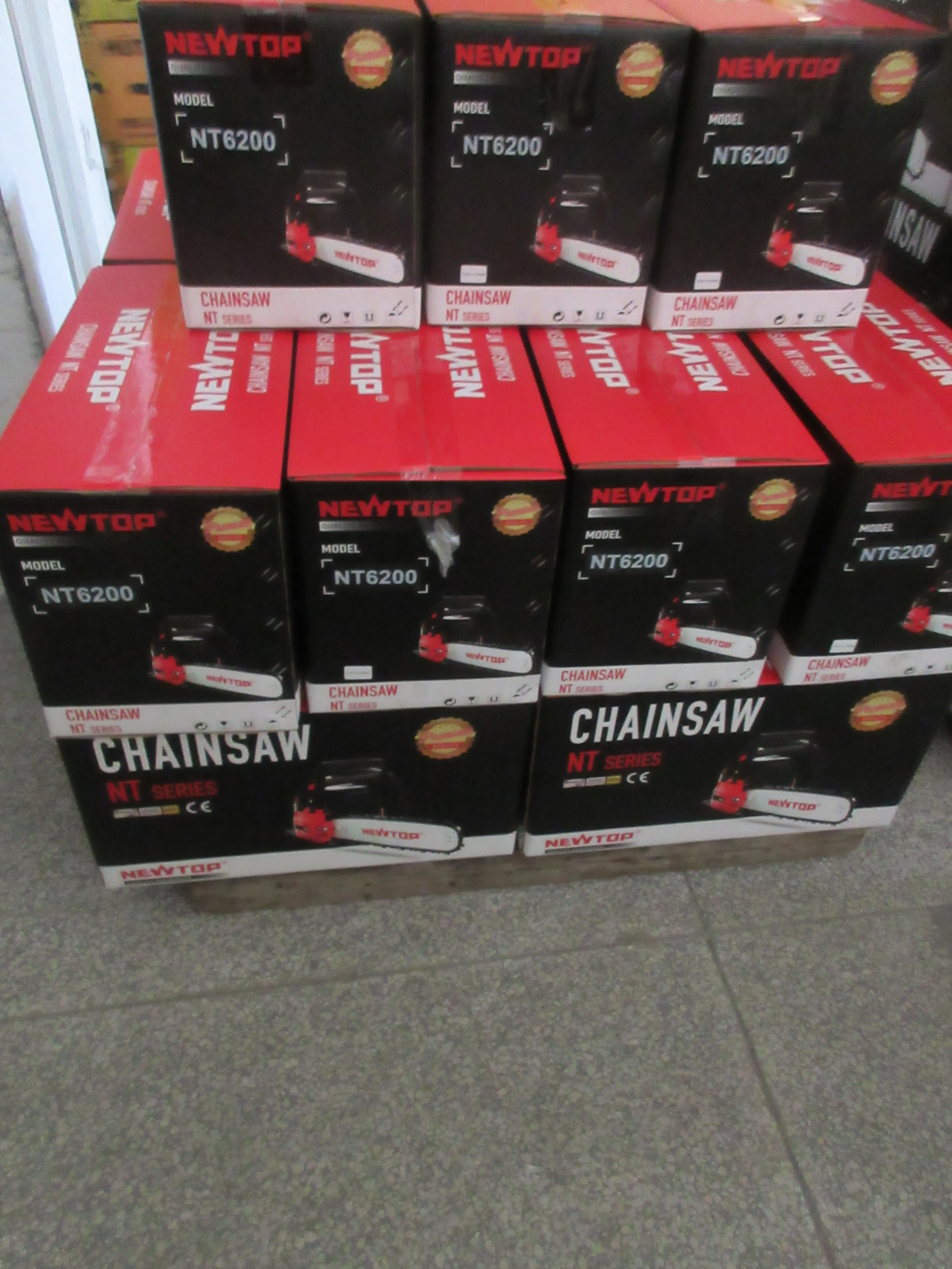 NEWTOP NT6200 chainsaw NT series product packaging stack in warehouse
