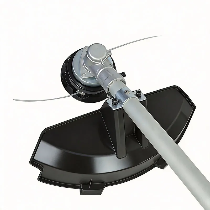 Close-up of NTBC401Li string trimmer head with black guard and trimmer line attached to shaft.